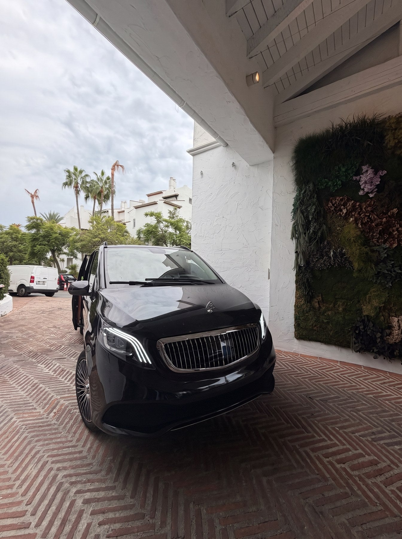 Black Maybach VIP van of Marbella VIP Ride at a Marbella hotel entrance